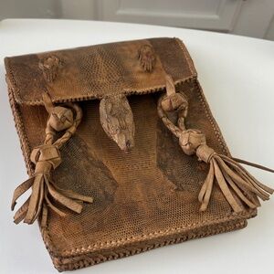 Vintage Handcrafted Leather Shoulder Bag / Rustic Animal Motif with Tassels